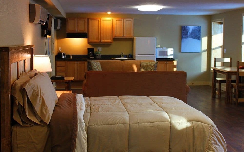 Double Queen XL Suite seen from the entry, both queen beds visible