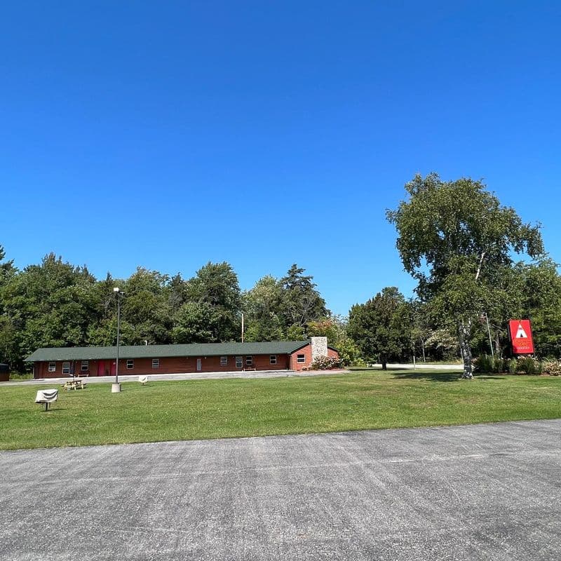 Wide view of the property grounds and parking