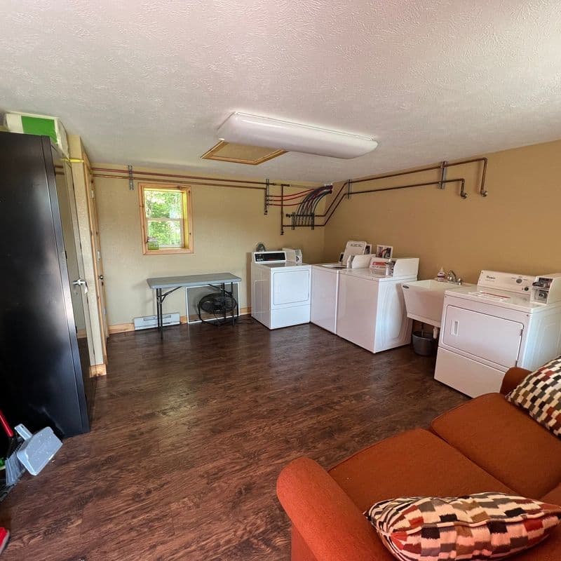 Coin-operated guest laundry room