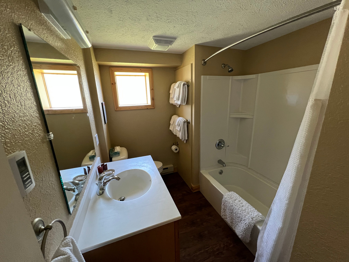 Full bathroom queen hotel suite paradise Michigan Tahquamenon suites
