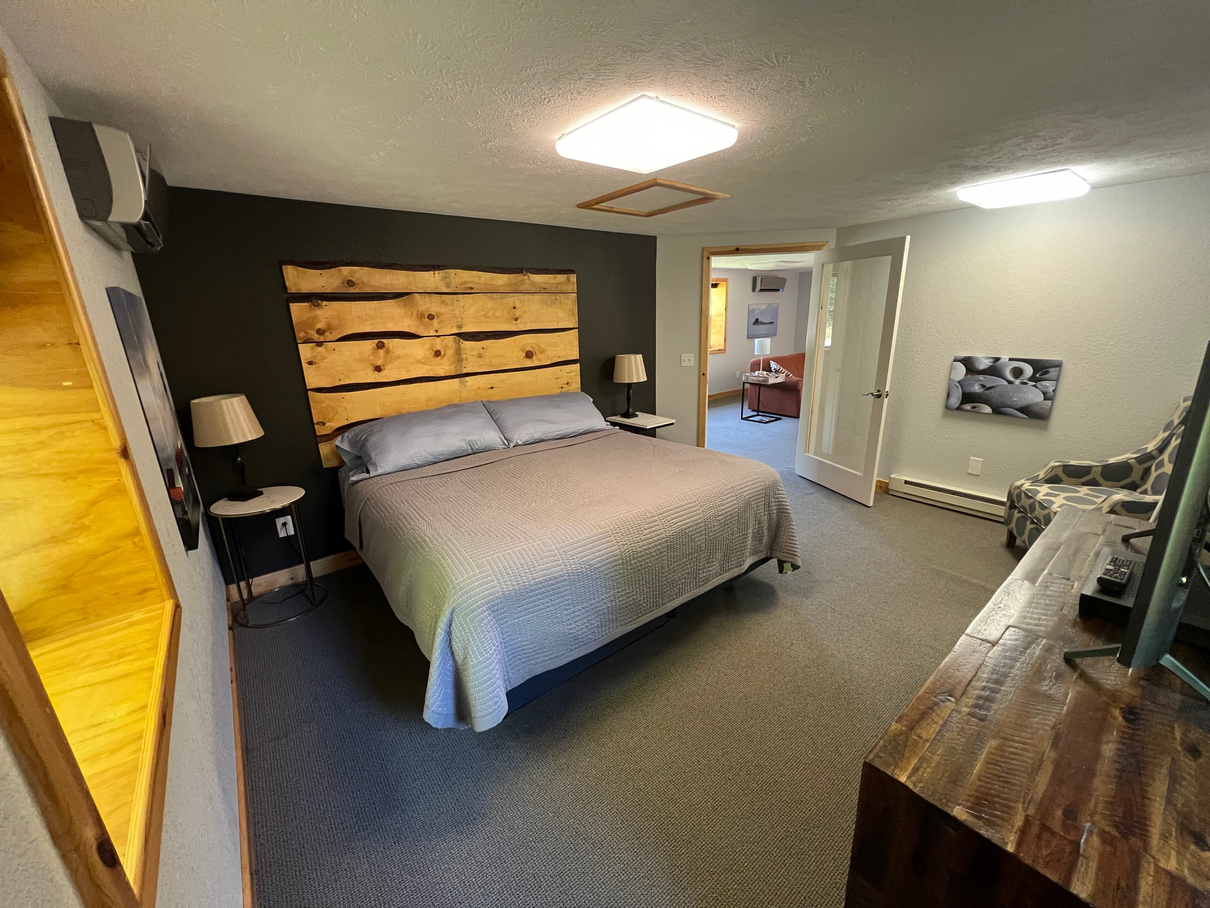 King family hotel suite paradise Michigan Tahquamenon suites lodging Master king bedroom