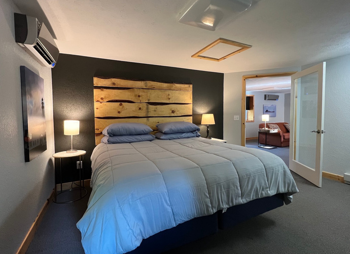 King bed family hotel suite paradise Michigan Tahquamenon suites